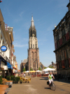 Netherlands - Delft  (Zuid-Holland): view to de Markt - Nieuwe kerk - bike - photo by  D.Hicks