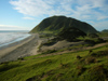 North Island - Coromandel Peninsula, Waikato region: beach and hill - photo by M.Samper