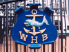 96 New Zealand - North Island - Wellington - WHB - Wellington Harbour Board symbol on a gate - photo by Miguel Torres