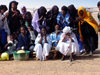 Agadez, Tchirozerine arrondissement, Niger: Ar Tuaregs sing the airport - photo by A.Obem