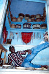 Nigeria - Kano: basket seller with an attitude - photo by Dolores CM