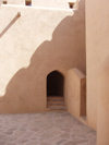 Oman - Nizwa: doorway in the fort - photo by B.Cloutier