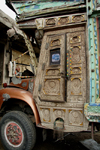 Peshawar, NWFP, Pakistan: decorated carved wooden doors of a truck - photo by G.Koelman