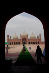 Lahore, Punjab, Pakistan: Badshahi mosque, the 'Emperor's Mosque' - image framed by an arch - photo by G.Koelman