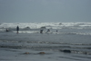 Karachi, Sindh, Pakistan: cooling off! - men and boys swimming in the Arabian sea at Clifton Beach - photo by R.Zafar