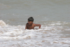 Karachi, Sindh, Pakistan: boy swimming in the Arabian sea at French Beach - photo by R.Zafar