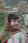 Jabbar, Siran Valley, North-West Frontier Province, Pakistan: smiling girl with covered head - hijab - photo by R.Zafar