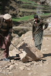Kodar Bala, Siran Valley, North-West Frontier Province, Pakistan: old man breaking stones for construction - photo by R.Zafar