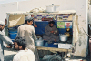 Taftan - Baluchistan / Balochistan: tea seller - market scene / Prodava aje - photo by J.Kaman