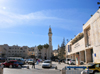 Bethlehem, West Bank, Palestine: Manger Square - esplanade between the Mosque of Omar and the Church of the Nativity - Center of Bethlehem - Peace Center building on the right - Piazza della Mangiatoia di Betlemme - photo by M.Torres