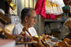 Panama City: leather goods vendor waits for his clients at La Bajada de Salsipuedes - photo by H.Olarte