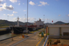 Panama Canal: Miraflores locks - the Chimborazo is towed by the locomotives - photo by H.Olarte