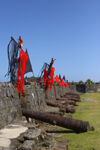 Fuerte de San Jeronimo - cannons and flags, Portobello, Coln, Panama, Central America, during the bi-annual Devils and Congos festival - UNESCO World Heritage Site - photo by H.Olarte