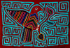 Panama - comarca Kuna Yala - San Blas Islands - Achutupo island: parrot decorating a Kuna Mola or Dulemola blouse - Kuna women's national dress - textile art - photo by G.Frysinger