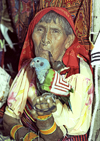 Panama - comarca Kuna Yala - San Blas Islands: Kuna woman smoking a pipe - photo by A.Walkinshaw