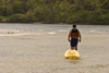 Isla Grande, Colon province, Panama: lone man with a kayak - photo by H.Olarte
