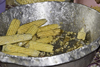 La Villa, Azuero, Los Santos province, Panama: corn cobs on a metal pan at El Ciruelo folk food place - photo by H.Olarte