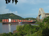 Panama Canal: Panamax Container Ship passing under Puente de las Americas - Americas Bridge - photo by H.Olarte
