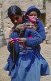 Cuzco region, Peru: Quechua woman with baby  Inca descendents - photo by C.Lovell