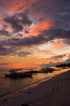 Alona Beach, Bohol island, Central Visayas, Philippines: bancas at sunset - beach scene - photo by S.Egeberg