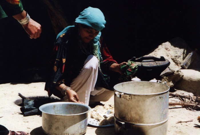 afghanistan1: Afghanistan: Woman cooking outdoors - photo by Anne Dinnan - (c) Travel-Images.com - Stock Photography agency - the Global Image Bank