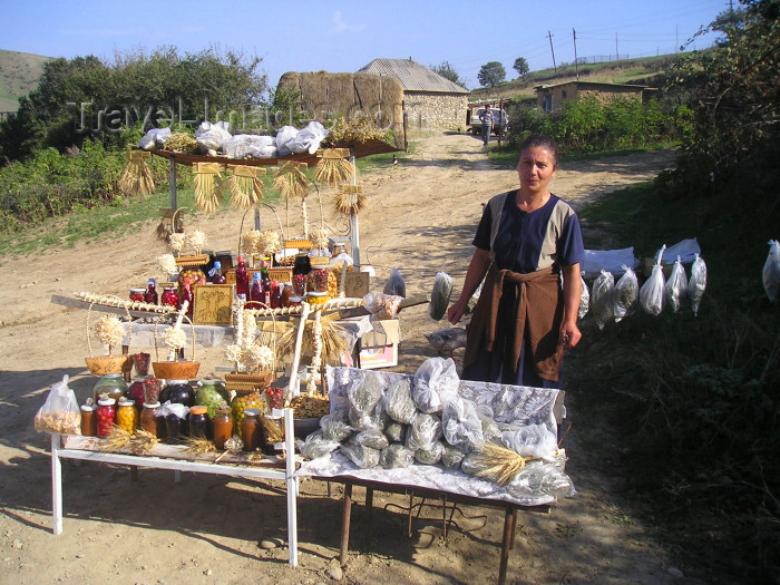 azer181: Qala Alti - Davachi rayon, Azerbaijan: lady selling pickles and herbs - photo by F.MacLachlan - (c) Travel-Images.com - Stock Photography agency - Image Bank