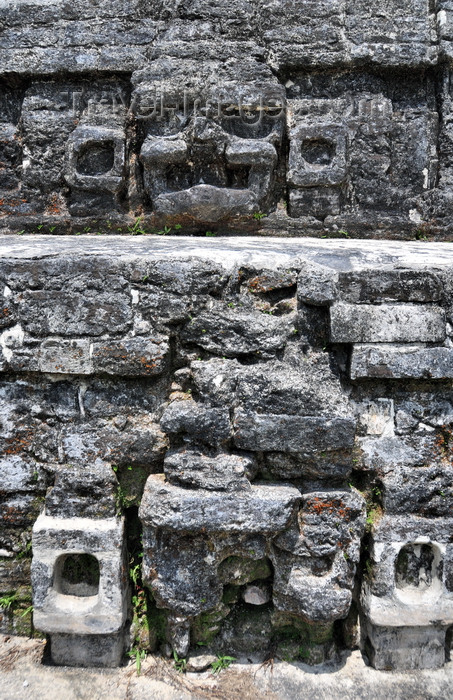 belize85: Altun Ha Maya city, Belize District, Belize: Temple of the Masonry Altars, stone masks of Mayan gods decorate the SW corner - photo by M.Torres - (c) Travel-Images.com - Stock Photography agency - Image Bank
