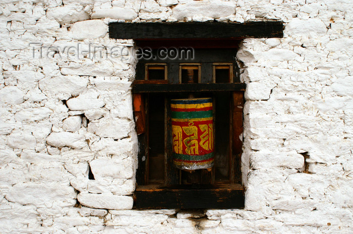 bhutan329: Bhutan - Jampa Lhakhang - white wall with prayer wheels - photo by A.Ferrari - (c) Travel-Images.com - Stock Photography agency - Image Bank