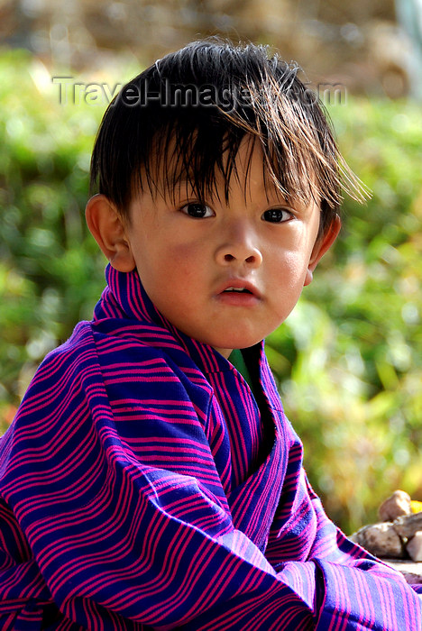 bhutan415: Bhutan, Paro, Young boy in traditional dress - photo by J.Pemberton - (c) Travel-Images.com - Stock Photography agency - Image Bank