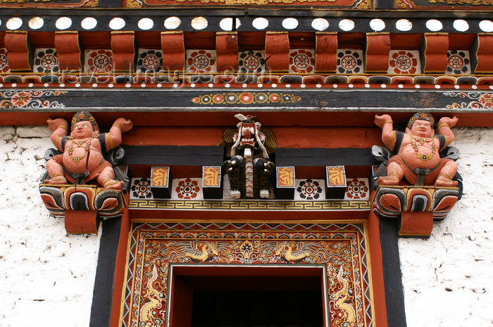 bhutan60: Bhutan - Thimphu - inside Trashi Chhoe Dzong - beautiful wood carvings - sumo wrestlers  - photo by A.Ferrari - (c) Travel-Images.com - Stock Photography agency - Image Bank