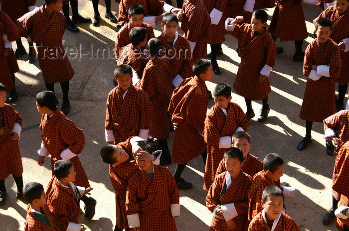 bhutan67: Bhutan - Paro: school - wearing ghos - national dress for Bhutanese men - introduced in the 17th century by Shabdrung Ngawang Namgyel - photo by A.Ferrari - (c) Travel-Images.com - Stock Photography agency - Image Bank