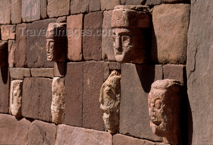 bolivia141: Tiwanaku / Tiahuanacu, Ingavi Province, La Paz Department, Bolivia: carved enemy heads along the walls of the Semi-Underground Temple - photo by C.Lovell - (c) Travel-Images.com - Stock Photography agency - Image Bank