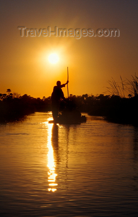 botswana61: Okavango delta, North-West District, Botswana: Mokoro dugout canoe at sunset - punting - photo by C.Lovell - (c) Travel-Images.com - Stock Photography agency - Image Bank