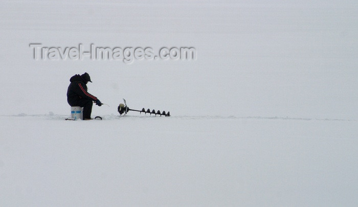 canada86: Canada / Kanada - Saskatchewan: Canadian man fishing in the ice - photo by M.Duffy - (c) Travel-Images.com - Stock Photography agency - Image Bank