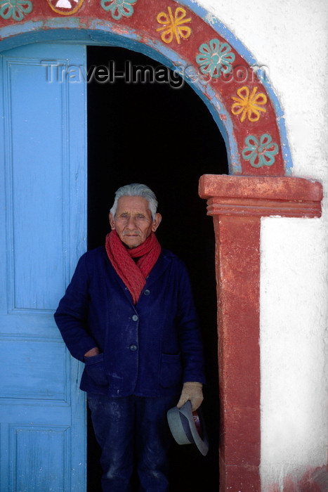 chile243: Lauca National Park, Arica and Parinacota region, Chile: Aymara grounds keeper of the 17th century adobe church in the village of Parinacota - Norte Grande - photo by C.Lovell - (c) Travel-Images.com - Stock Photography agency - Image Bank