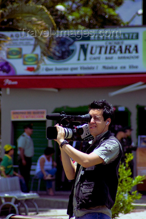 colombia25: Medellín, Colombia: camera operator at work near restaurante Nutibara - photo by E.Estrada - (c) Travel-Images.com - Stock Photography agency - Image Bank