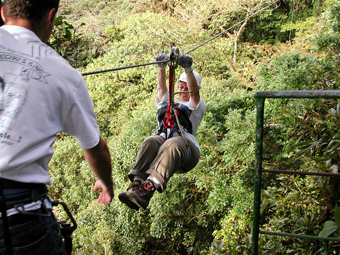 costa-rica59: Monteverde - Puntarenas province, Costa Rica: sky trekker and guide - rain forest canopy tour - photo by B.Cain - (c) Travel-Images.com - Stock Photography agency - Image Bank