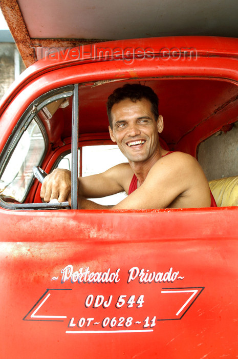 cuba67: Cuba - Holguín - driver of a classic 1950's era Ford truck poses for the camera - photo by G.Friedman - (c) Travel-Images.com - Stock Photography agency - Image Bank