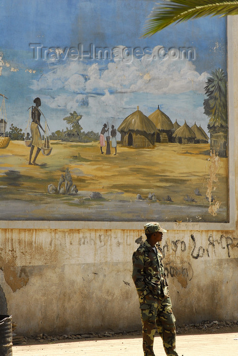 eritrea14: Eritrea - Asmara: soldier in front of a mural with a village scene - photo by E.Petitalot - (c) Travel-Images.com - Stock Photography agency - Image Bank