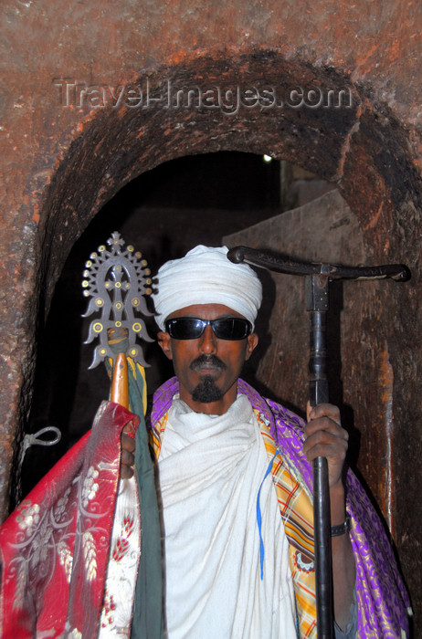 ethiopia173: Lalibela, Amhara region, Ethiopia: Bet Mikael church - Coptic priest with cross and mequamia praying stick - photo by M.Torres - (c) Travel-Images.com - Stock Photography agency - Image Bank