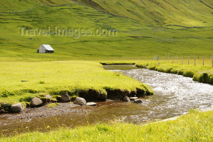 faeroe12: Elduvik village, Eysturoy island, Faroes: small house, stream and grass fields - photo by A.Ferrari - (c) Travel-Images.com - Stock Photography agency - Image Bank