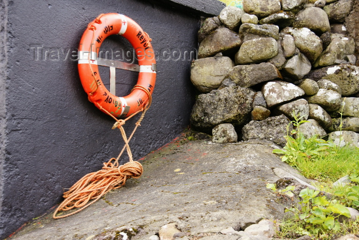 faeroe31: Elduvik village, Eysturoy island, Faroes: lifebuoy and stone wall - photo by A.Ferrari - (c) Travel-Images.com - Stock Photography agency - Image Bank