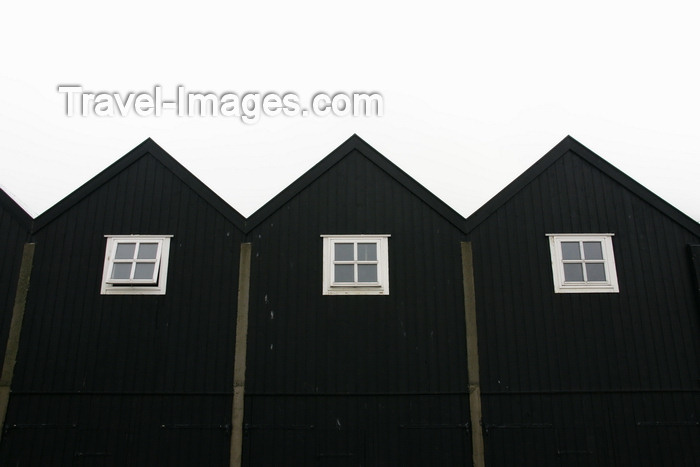 faeroe9: Norðragøta village, Eysturoy island, Faroes: black boat houses in the harbour - photo by A.Ferrari - (c) Travel-Images.com - Stock Photography agency - Image Bank