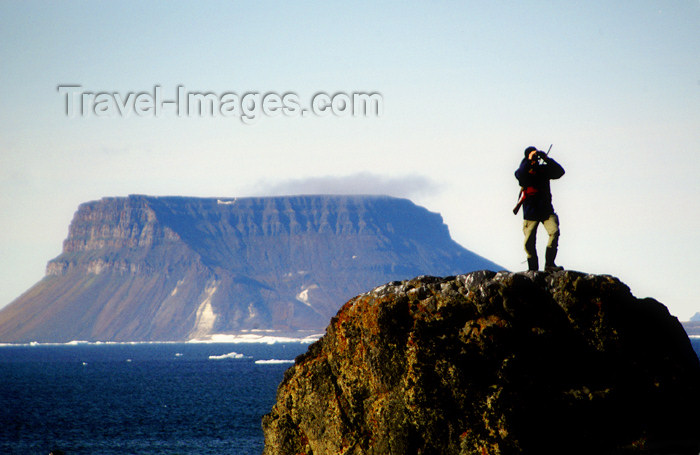 franz-josef20: Franz Josef Land Armed guard on lookout rock, Flora Island - Arkhangelsk Oblast, Northwestern Federal District, Russia - photo by Bill Cain - (c) Travel-Images.com - Stock Photography agency - Image Bank