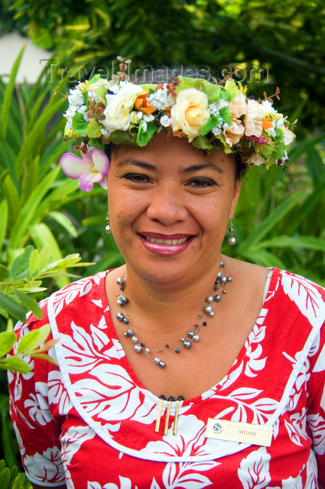 french-polynesia42: Papeete, Tahiti, French Polynesia: smiling Tahitian woman, wearing a flower garland - photo by D.Smith - (c) Travel-Images.com - Stock Photography agency - Image Bank