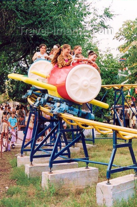gagauzia5: Comrat / Komrat, Gagauzia, Moldova: children on a roller coaster - amusement park in the town center - photo by M.Torres - (c) Travel-Images.com - Stock Photography agency - Image Bank