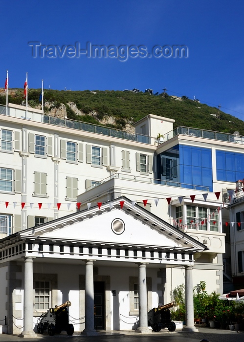 gibraltar95: Gibraltar: Guard House of the residence of the Governor of Gibraltar and Convent Place buildings, Main Street - cable car in the backround - photo by M.Torres - (c) Travel-Images.com - Stock Photography agency - Image Bank