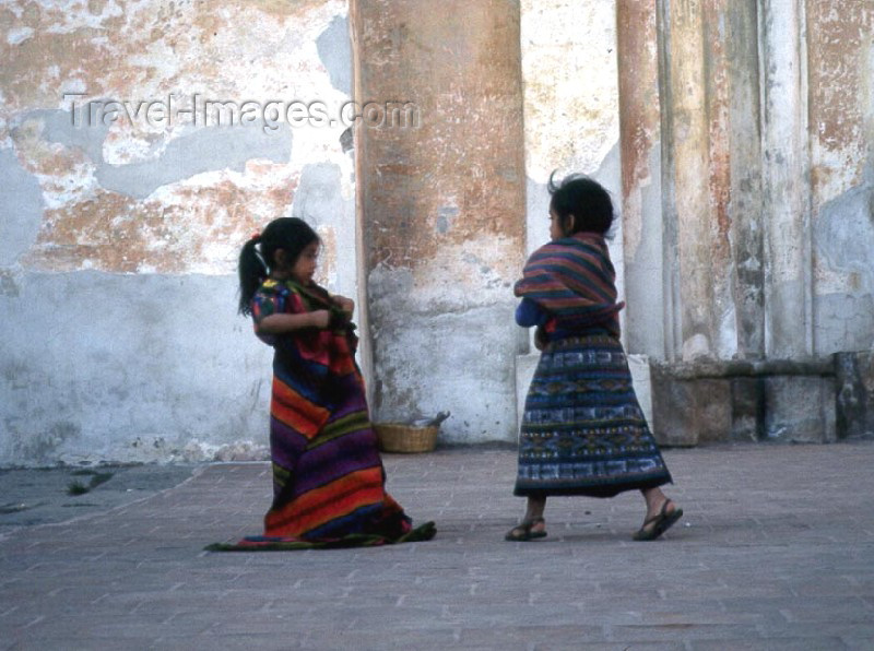 guatemala8: Guatemala - Antiqua Guatemala (Sacatepequez province): girls playing outside the church (photographer: Mona Sturges) - (c) Travel-Images.com - Stock Photography agency - Image Bank