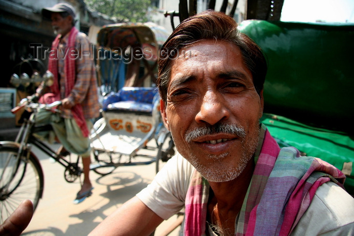 india475: Calcutta / Kolkata, West Bengal, India: face of rickshaw driver waiting for costumers - photo by G.Koelman - (c) Travel-Images.com - Stock Photography agency - Image Bank