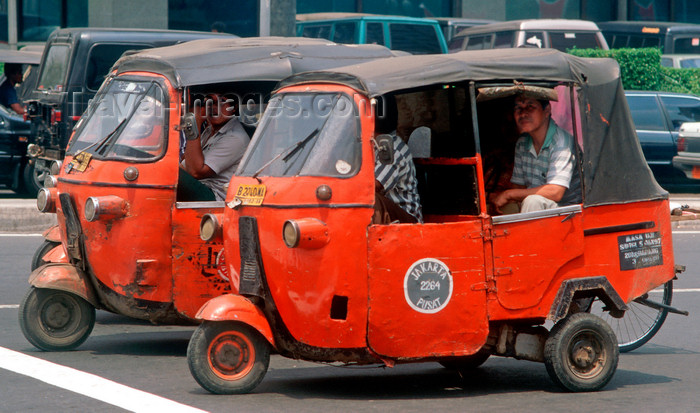 indonesia22: Jakarta, Indonesia - Jakarta city center - Tuk Tuk taxis - photo by B.Henry - (c) Travel-Images.com - Stock Photography agency - Image Bank